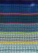 Detaljbild av vven Stoppa neutronbomben i bunden rosengng av textilkonstnr katrin bawah