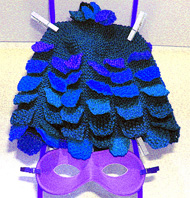 Rätstickad blå mössa med mosstickade flerpar